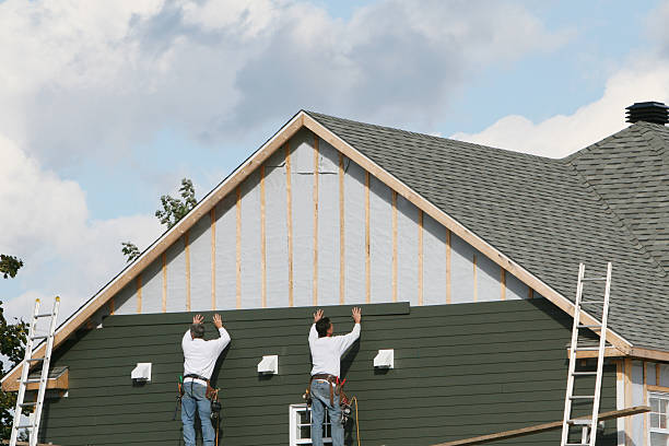 Professional Siding technician working in Helmetta, NJ